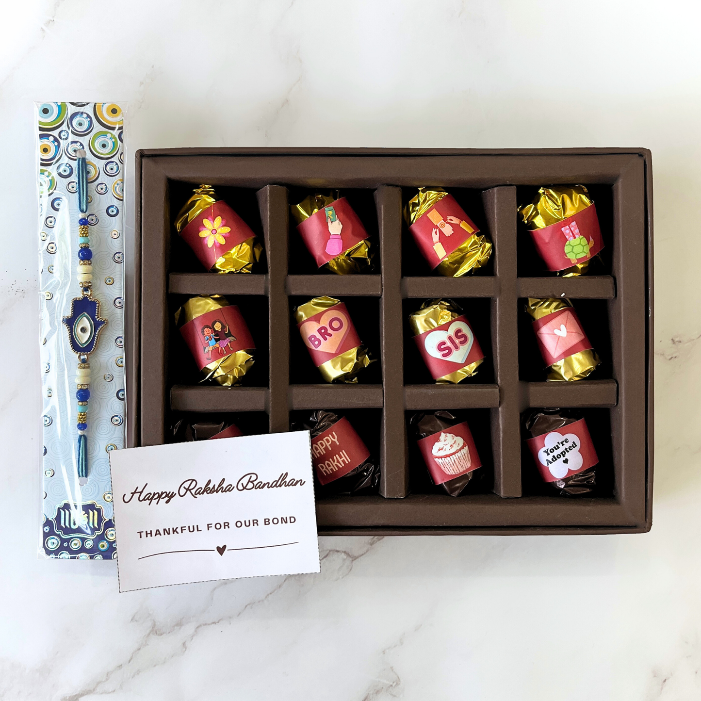 Rakhi Gift Box - 12 Pieces Assorted Chocolate Dates with Evil Eye Rakhi and Note - Raksha Bandhan Gift
